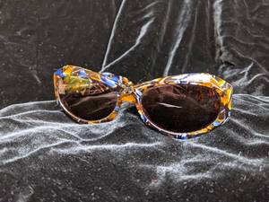 lot 121 image: Vintage Valentino Sunglasses in Blues and Browns Made in Italy