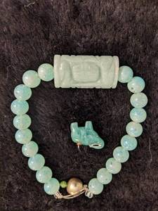 lot 206 image: Jade Bracelet and Elephant PendantCharm