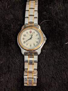 lot 211 image: Mens Silver and Gold Swiss Army Watch