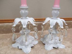 lot 18 image: vintage cast-iron candle holders, candle