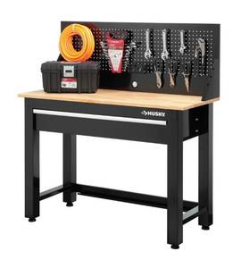 lot 12 image: HUSKY 4 ft. Solid Wood Top Workbench with Pegboard Storage