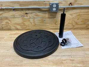 lot 37 image: WALKER EDISON FURNITURE COMPANY Circle Weave Round Outdoor Patio Umbrella Base - Black