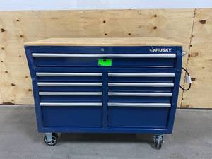 lot 66 image: HUSKY 46 in. W 9-Drawer, Deep Tool Chest Mobile Workbench in Gloss Blue with Hardwood Top