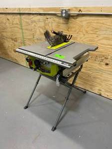 lot 104 image: RYOBI 15 Amp 10 in. Table Saw with Folding Stand