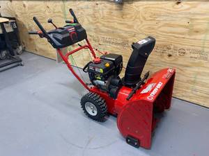 lot 1 image: TROY-BILT 24 in. 208 cc Two-Stage Gas Snow Blower with Electric Start Self Propelled