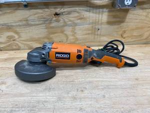 lot 55 image: RIDGID 15 Amp Corded 7 in. Twist Handle Angle Grinder