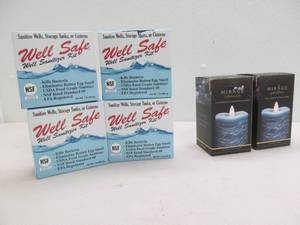 lot 124 image: Sanitizer kits, candles