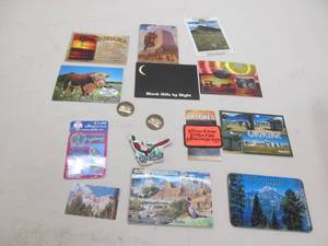 lot 127 image: Postcards, patches, decals, etc.