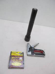 lot 128 image: Stapler, staples, flashlight