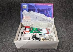 lot 405 image: Mac Tools Collectors Club Adult Collectable 124 Scale 2000 Mustang Funny Car - John Force
