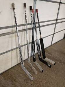 lot 305 image: Collection of Five Goalie Sticks