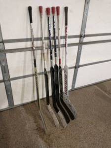 lot 306 image: Collection of Six Goalie Sticks