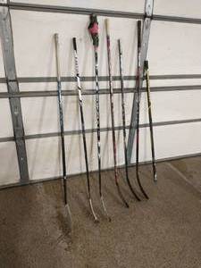 lot 307 image: Collection of Five Hockey Sticks