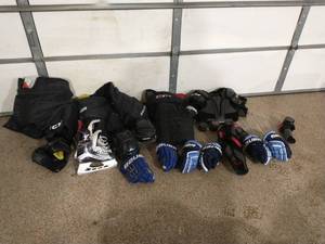lot 308 image: Collection of Used Hockey Equipement