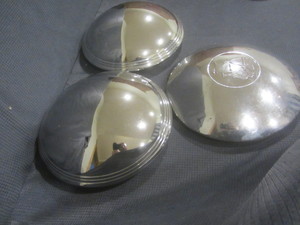 lot 105 image: Hub Caps - Dog Dish with Plymouth