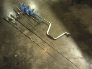lot 326 image: Ice Auger, Rods, Reels