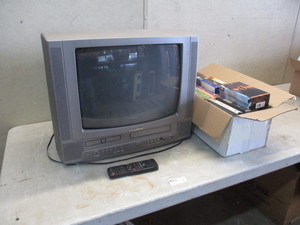 TV with DVDVHS players and VHS Tapes