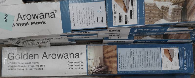 lot 29 image: Golden Arowana Cappuccino HDPC Waterproof Flooring, 7 Planks per box (16.81 SQ. FT.) (Dimensions 6 mm x 7.2 in x 48 in) 67.24 sq. ft.