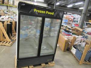 lot 18 image: True GDM-49F-HCTSL01 54 18 Black Glass Door Merchandiser Freezer with LED Interior Lighting - 115V
