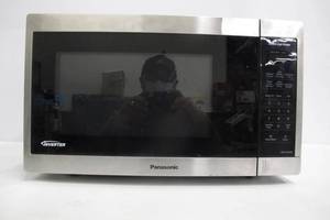 lot 13 image: Panasonic 1.3CuFt Stainless Steel Countertop Microwave Oven NN-SC668S