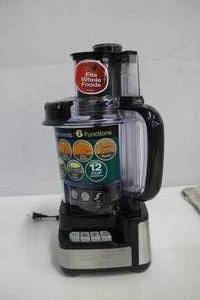 lot 23 image: Stack and Snap 12-Cup 3-Speed Stainless Steel and Black Food Processor.