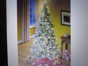 lot 21 image: Flocked Tree 7 ft open box Retail $...
