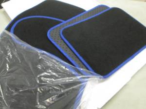 lot 124 image: Set of 4 Car Mats open box Retail $...