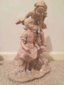lot 12 image: Boy & Girl By Apple Tree Statue