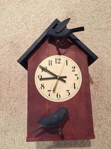 lot 25 image: Battery Operated Birdhouse Clock and Ceramic Bird House