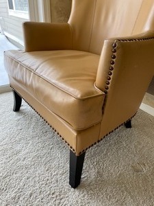 lot 61 image: Pleather Wingback Chair with Brad Detailing