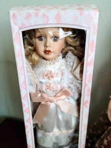 lot 82 image: Pair of Porcelain Dolls
