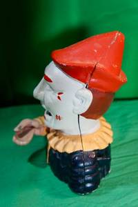 lot 92 image: Vintage Reproduction Cast Iron Jester Clown Mechanical Bank