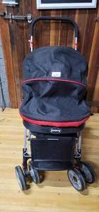 lot 82 image: Joovy Caboose Sit and Stand Tandem Double Stroller