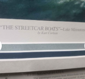 lot 126 image: Kurt Carlson Limited Edition The Streetcar Boats Lake Minnetonka Framed Print