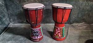 lot 68 image: 2 Small Hand Made Bongo Drums Marked Jerusalem