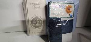 lot 217 image: New Old Stock King Size Pillow Cases & Sheet