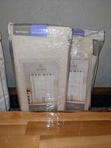 lot 170 image: Pair of JC Penney Home Bayview Tailored Grommet Valances 50 x 18