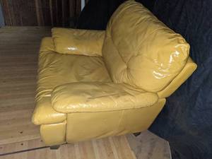 lot 29 image: Oversized Gold Leather Chair