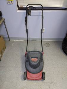 lot 53 image: Yard Machines 131000 Watt Lawn Mower