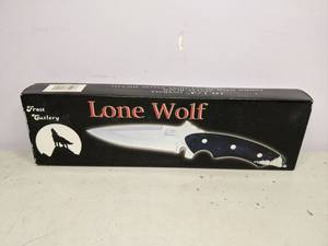 lot 130 image: Lone Wolf 10 14 Knife w Sheath