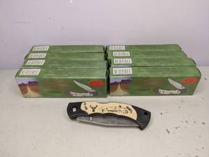 lot 139 image: Lot of Eight Road Runner Whitetail Folding Pocket Knives