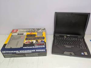 lot 122 image: Dell Inspiron Mini Notebook & Wireless Internet Gateway Kit