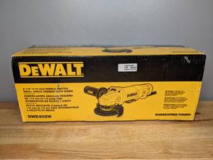 lot 26 image: Brand New DeWalt 4.5 Paddle Switch Small Angle Grinder 11 amp