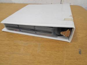 lot 44 image: 3 Ring Binder Full of Assorted Sports Cards