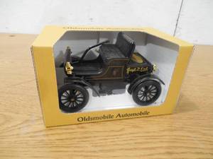 lot 155 image: Scale Models Joe Ertl Hard Signed Oldsmobile