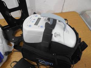 lot 169 image: INOGEN Portable Oxygen Concentrator