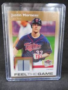 lot 277 image: 2007 Fleer Ultra Justin Morneau Jersey Relic Card