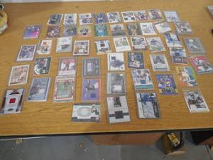 lot 295 image: (50) Football Jersey  Relic  Autograph Sports Card lot