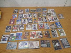 lot 297 image: (50) Football Jersey  Relic  Autograph Sports Card lot