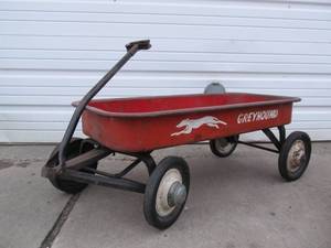 lot 13 image: Vintage GREYHOUND Red Metal Wagon